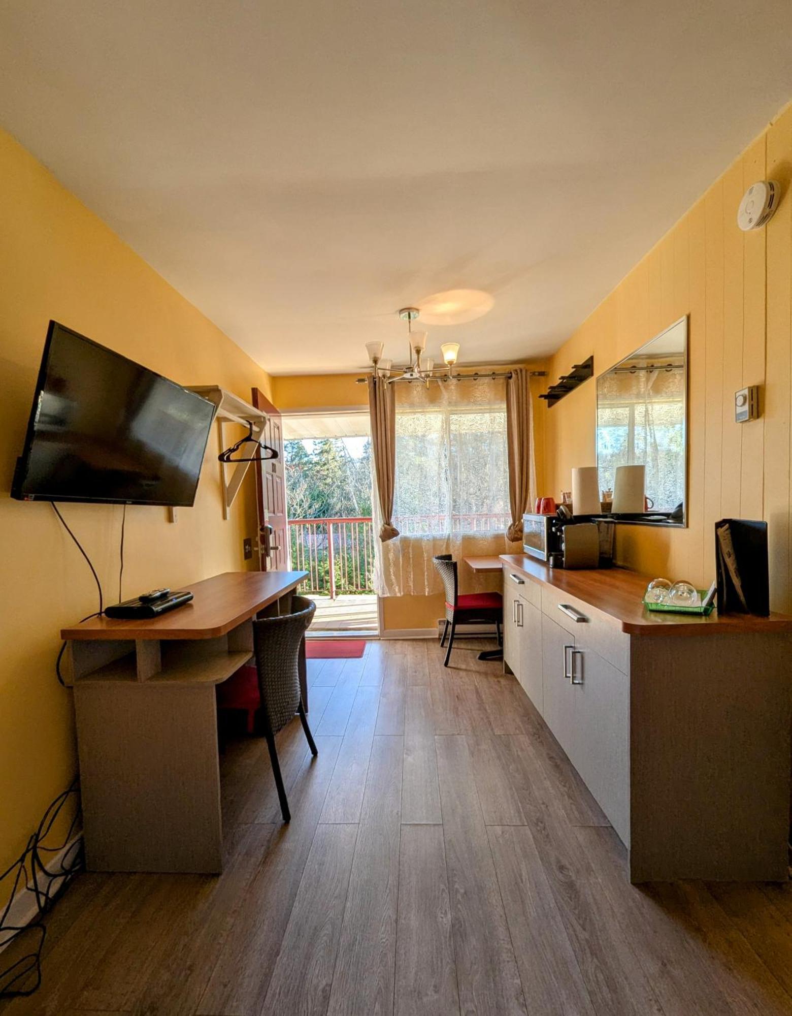 Motel Des Pentes Et Suites Saint-Sauveur Ngoại thất bức ảnh